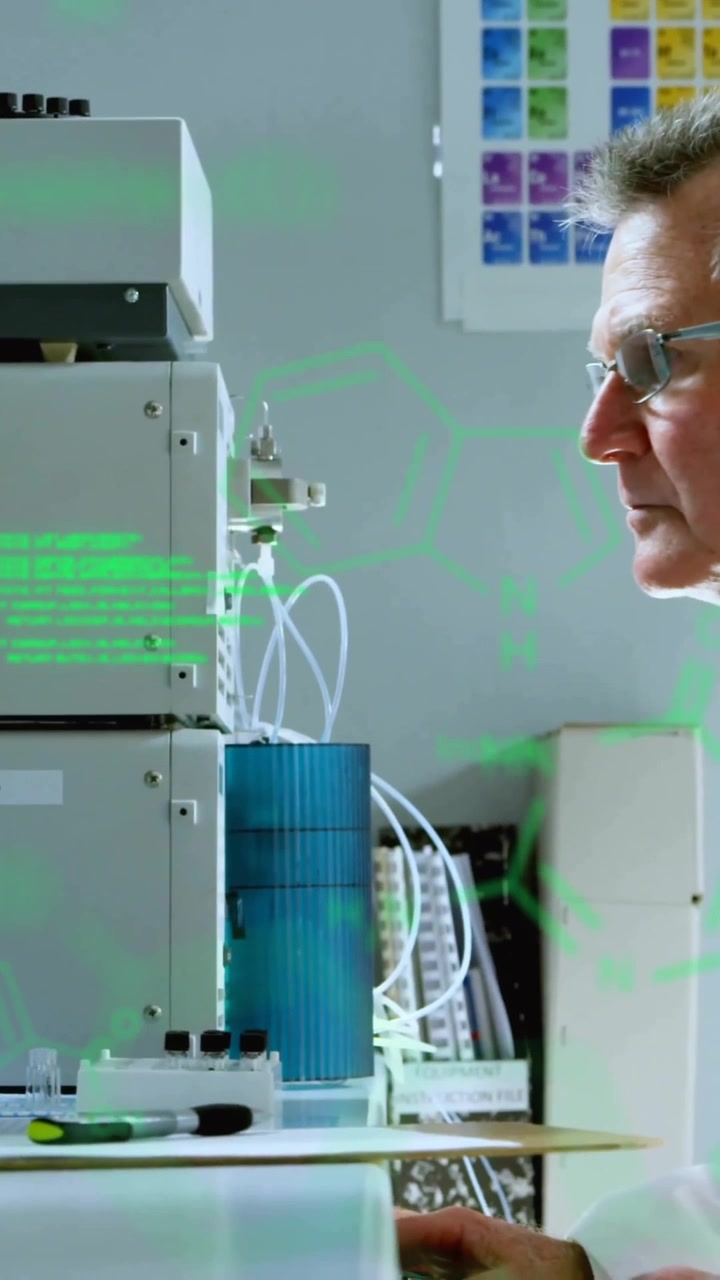 Animation of data processing and chemical formula over caucasian male scientist using computer