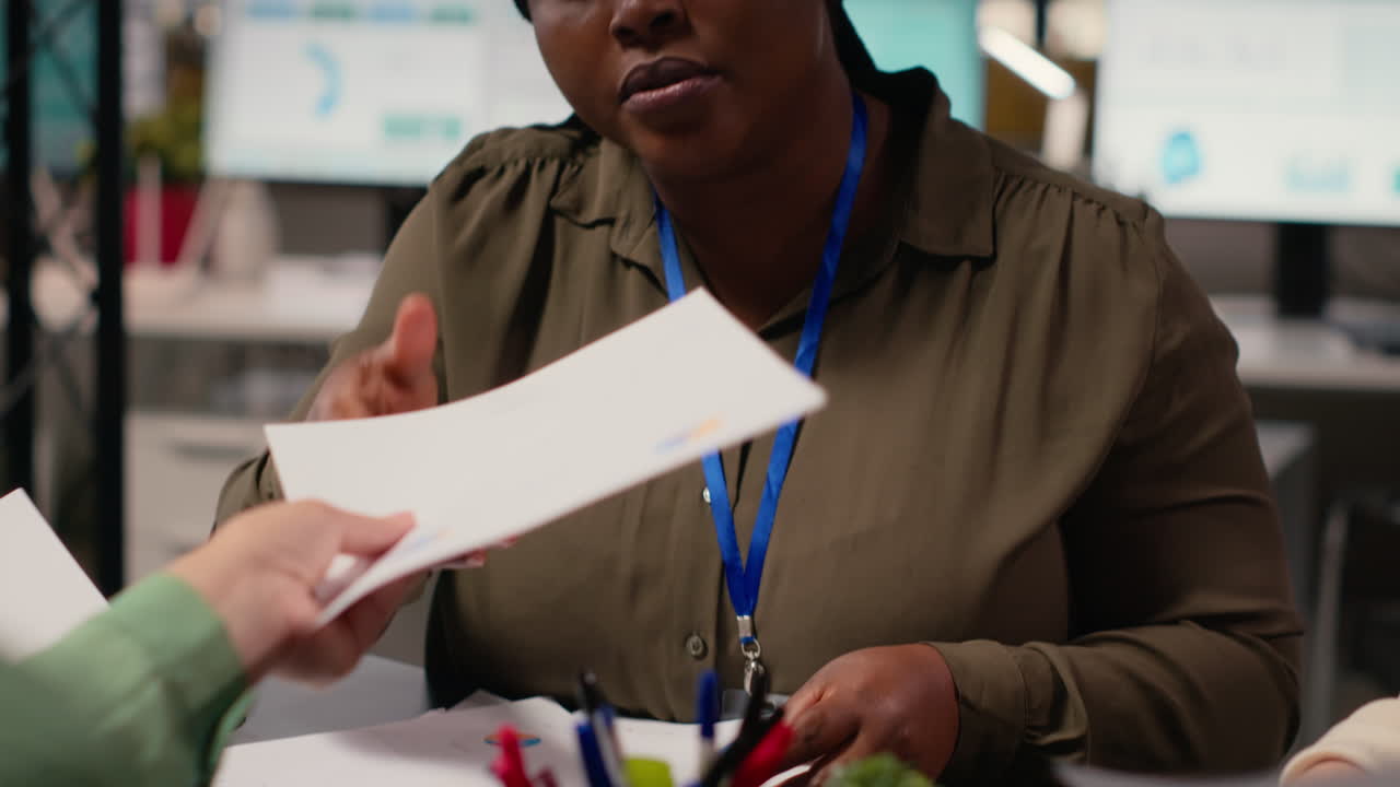 Vertical Video Four women setting a strategy and exchanging insights in multinational company