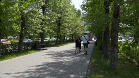 couple walking through a park