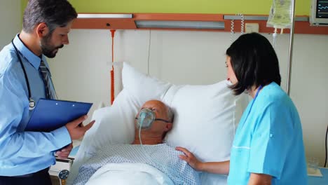 doctor and nurse interacting with patient