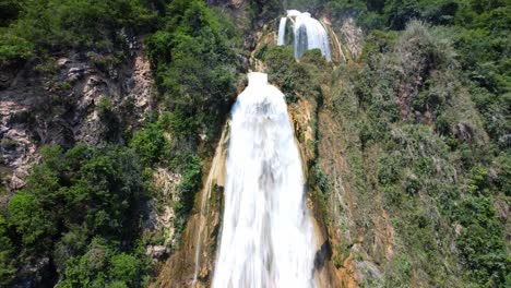 mesmerizing aerial footage of the velo de novia blue waterfalls, in chiapas, mexico