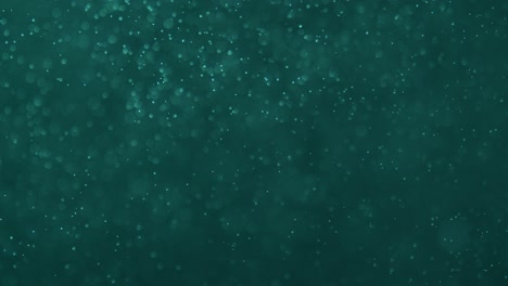abstract shot of tiny air bubbles floating in water