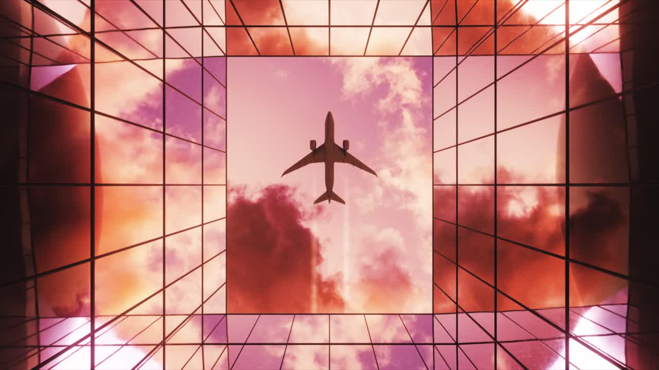 해가 지면 도시 위를 날아다니는 비행기