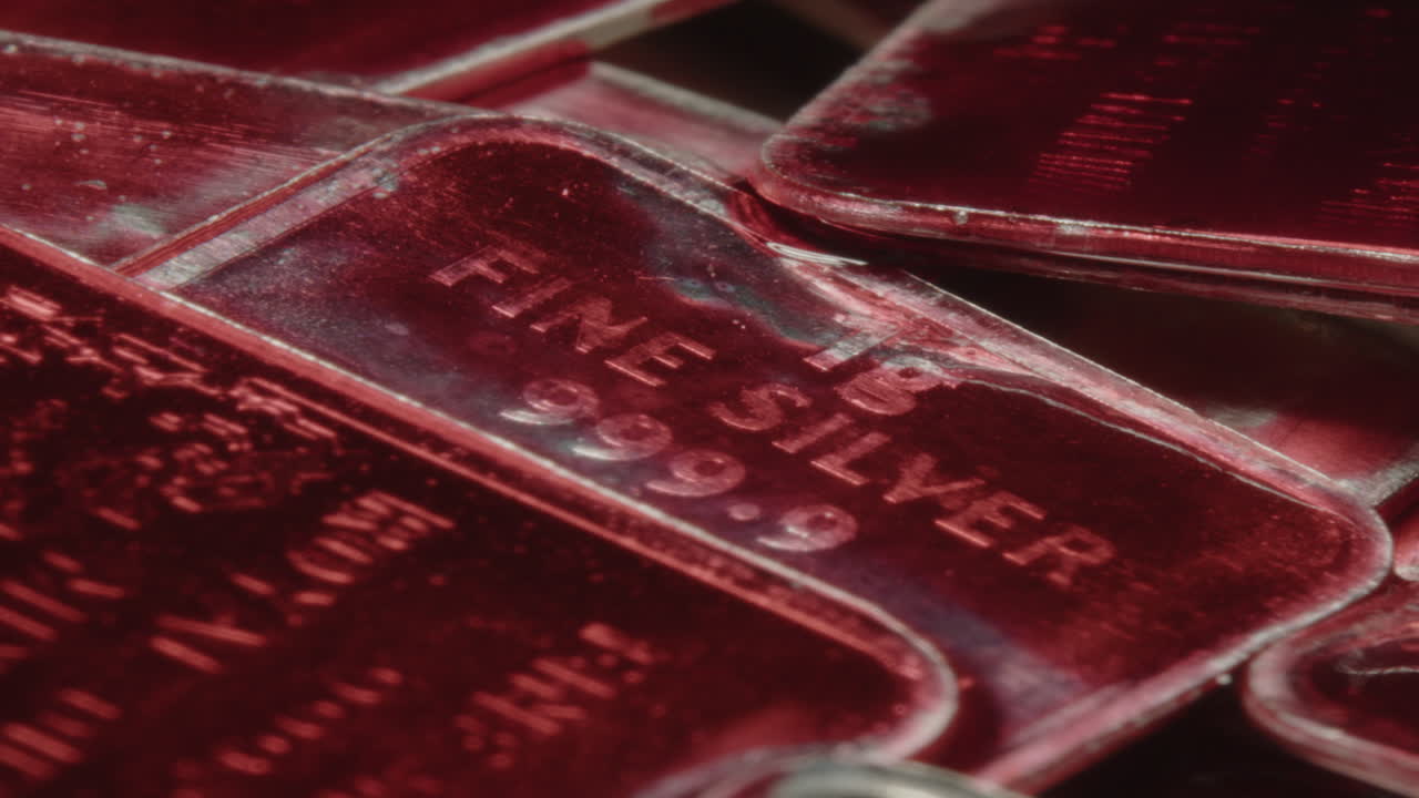 Zoom out from a silver bar covered in blood, a large stack of bloody silver plates gets revealed