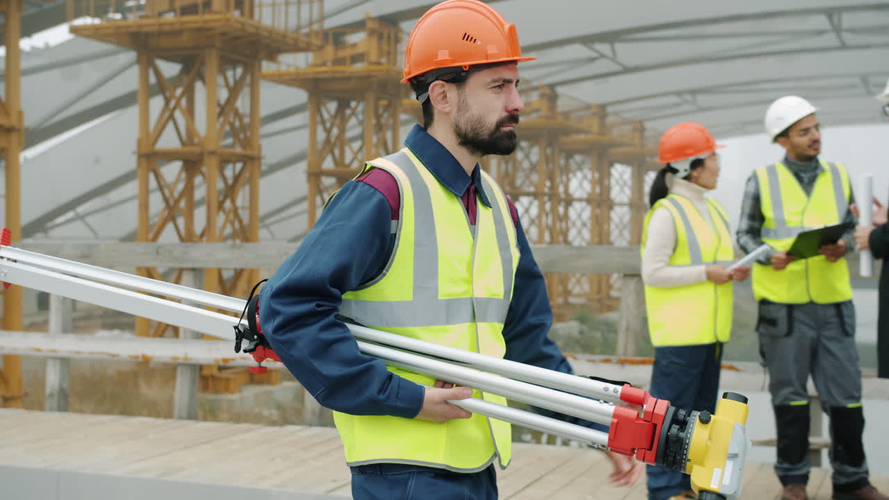 Construction Workers Surveying a Bridge Site