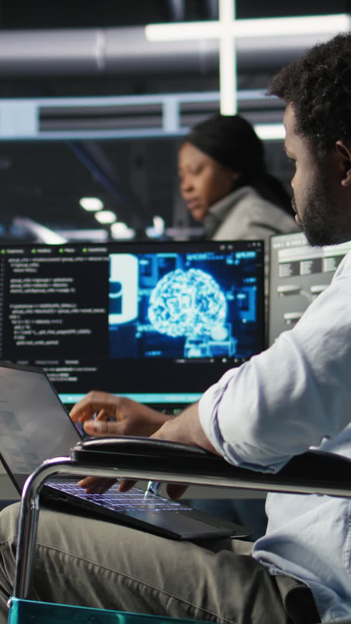 Vertical Video Data Center Computer Scientist In Wheelchair Using Ai Node Tree Software