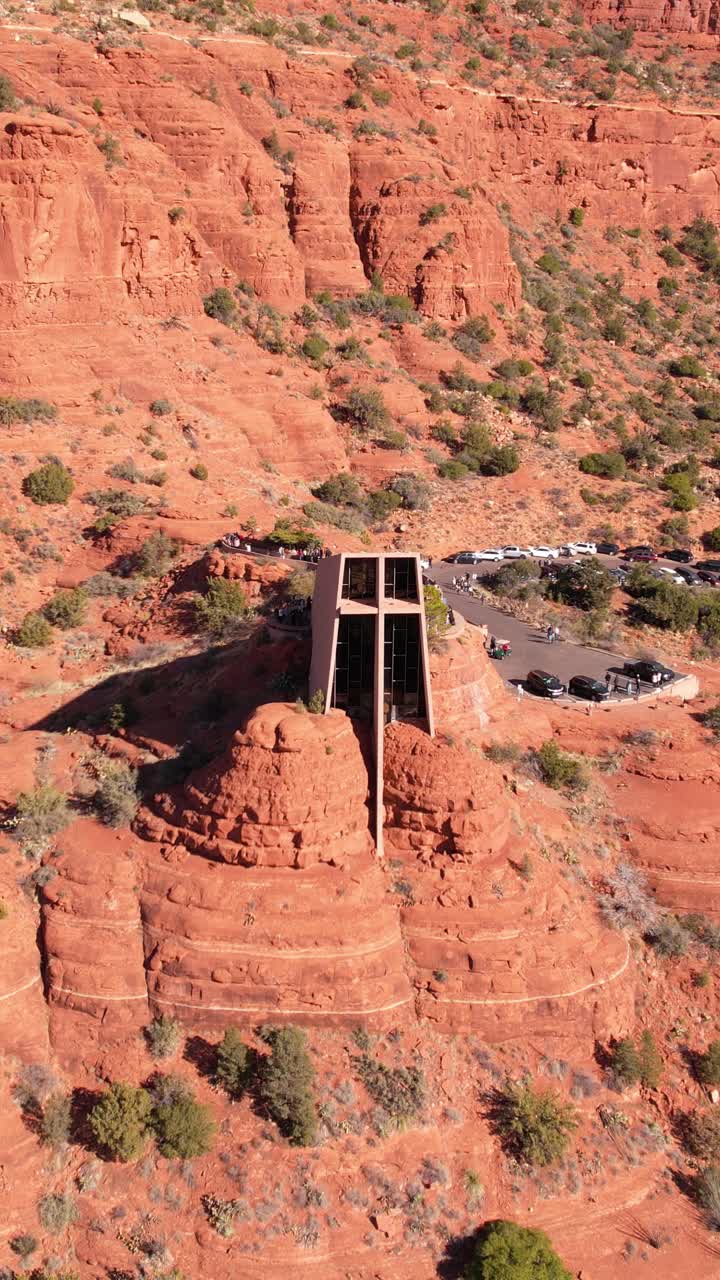 Vertical Drone Shot, Chapel of Holy Cross Landmark of Sedona Arizona USA in Desert Landscape