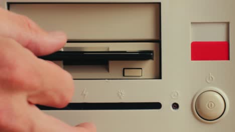 using diskette for old computer. music recorder, playing retro computer games. vintage device for office, obsolete technology. . high quality 4k footage
