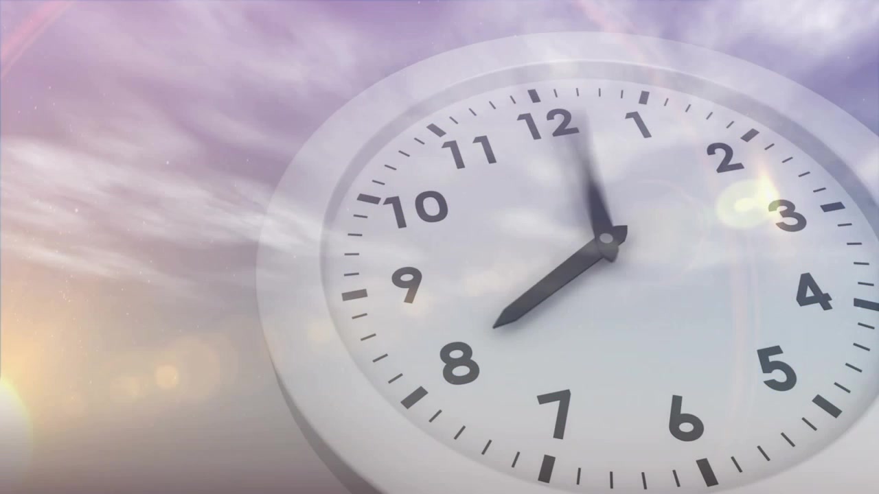 Animazione di testo "Buon anno nuovo" su orologio