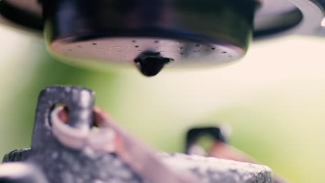 close up of slow dripping coffee brewing in vietnam