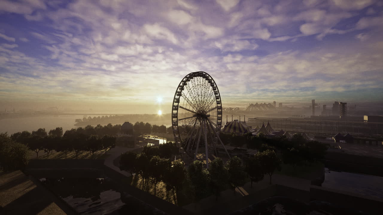Beautiful sunset view over a ferris wheel near a waterfront