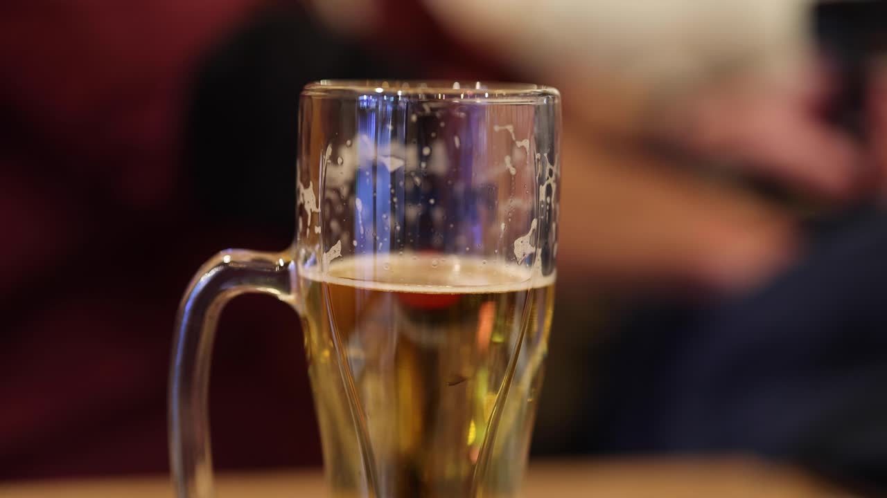 Rotating beer glass in a close-up view
