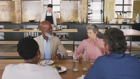 friends talking together at the table