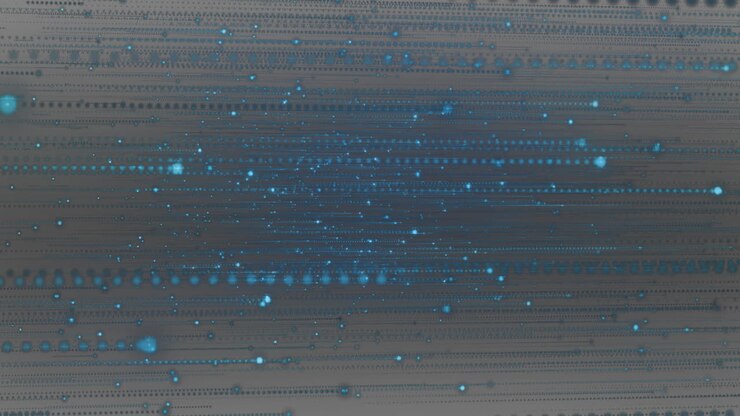 Leuchtende blaue Partikel sammeln sich im Zentrum, während sie entlang horizontaler Datenreihen in 3D-Darstellung strömen