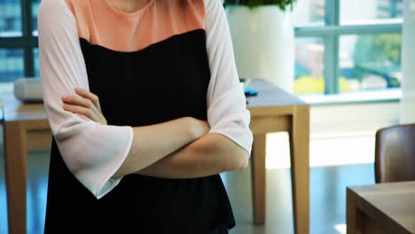 confident female executive in office