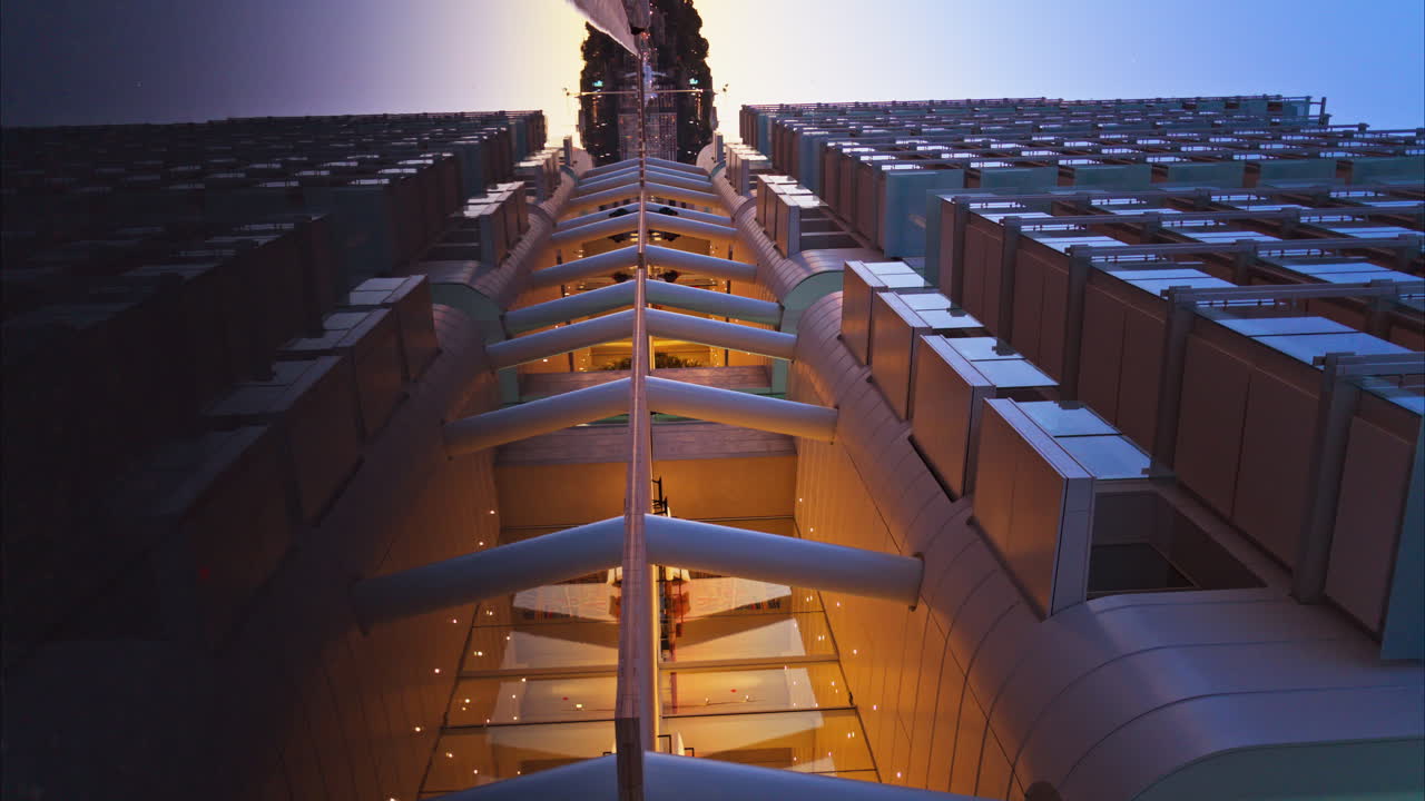 Close up of a building in the Mareterra new Residential district in Monaco in the evening. Vertical