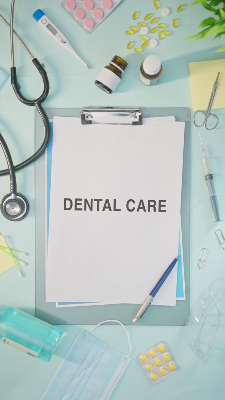 VERTICAL VIDEO OF DENTAL CARE WRITTEN ON MEDICAL PAPER