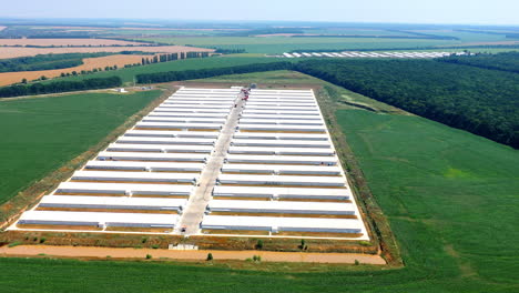 flying drone of big farm. aerial drone view of industrial poultry farm
