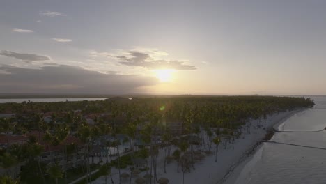 aerial view of tropical beach resort at sunset