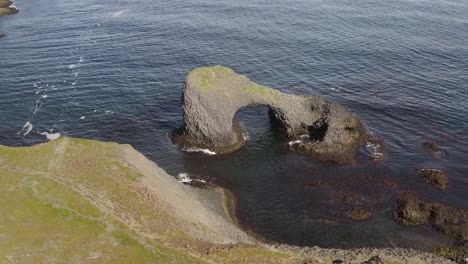 sea arch formation in the raudanes peninsula during summer in iceland