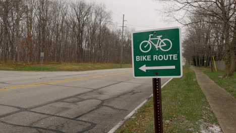 bike route sign in winter landscape