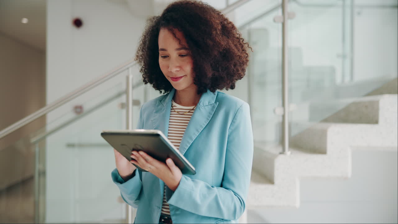 Businesswoman using tablet in office