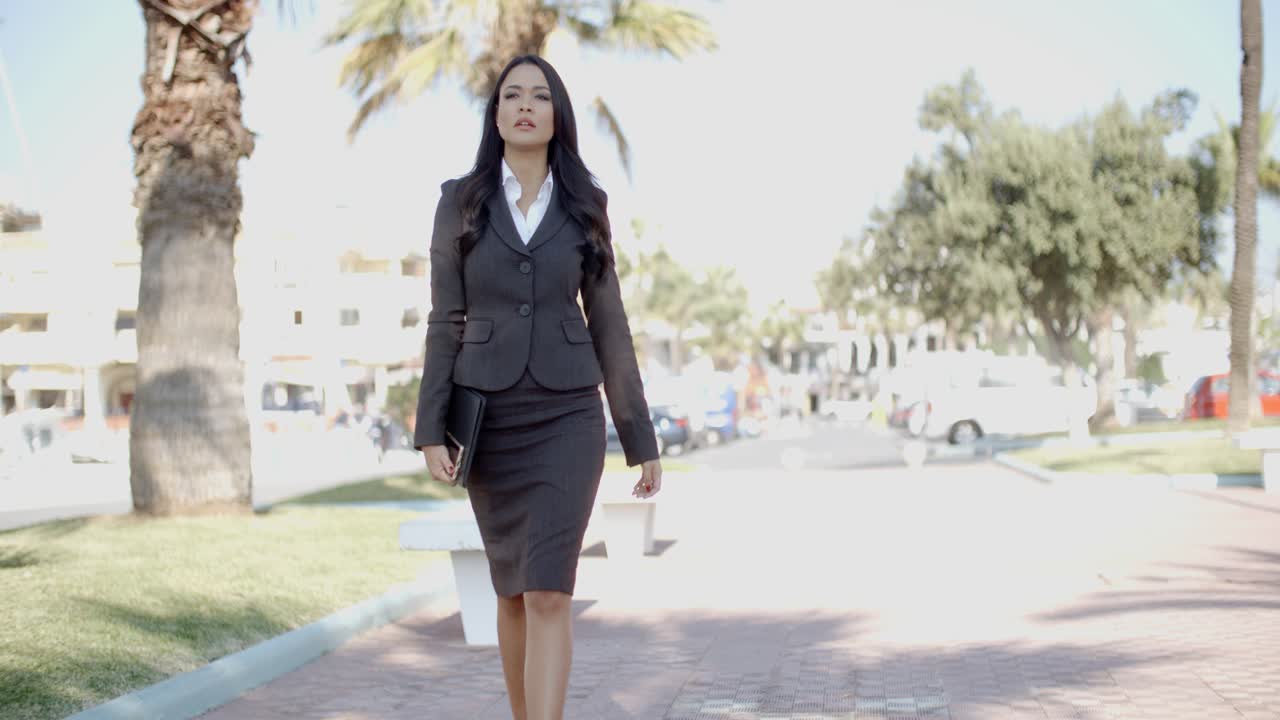 Lady In A Suit Walking Down The Street
