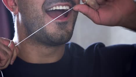 el uso del hilo dental