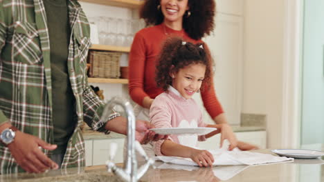 Family doing dishes together