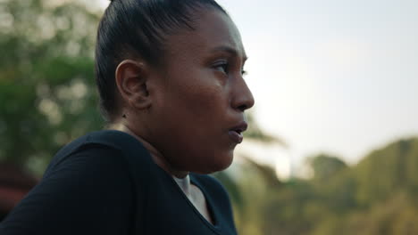 portrait of a woman looking up outdoors