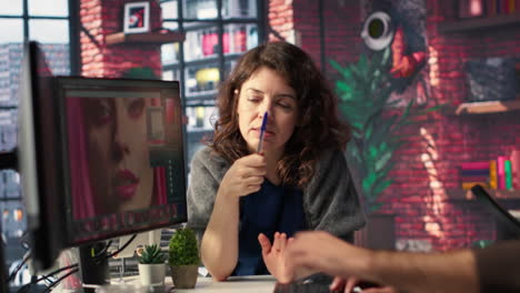 creative team work with ai chatbot and editing software to improve content