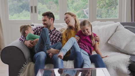 family having fun in a comfortable home 4k