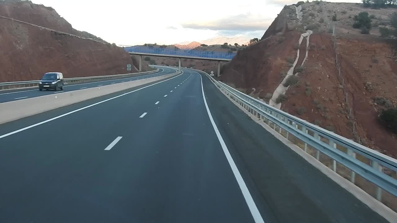 highway between Agadir and Marrakech crossing the Argan trees land in rural . transport and traveling background,backdrop. Morocco