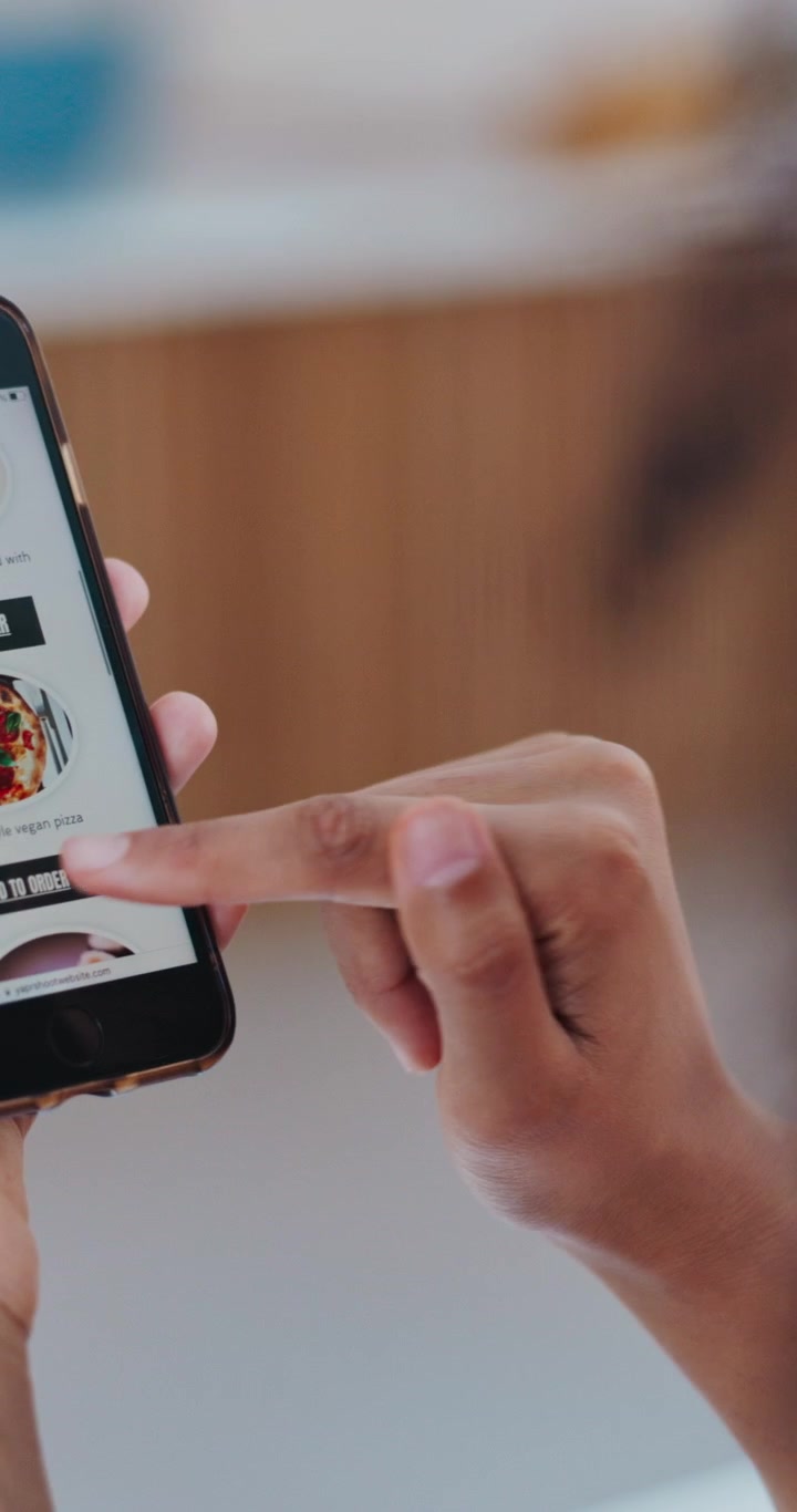 Person Ordering Food Online Using a Smartphone