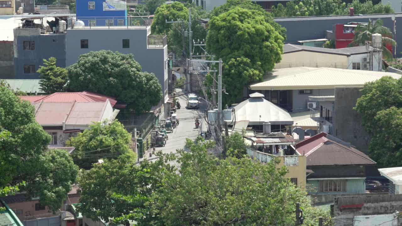 Manila Philippines outskirts house neighbourhood day time Southeast Asia