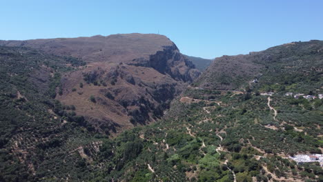 aerial view across topolia gorge, canyon and lush mountain valley, crete, greece