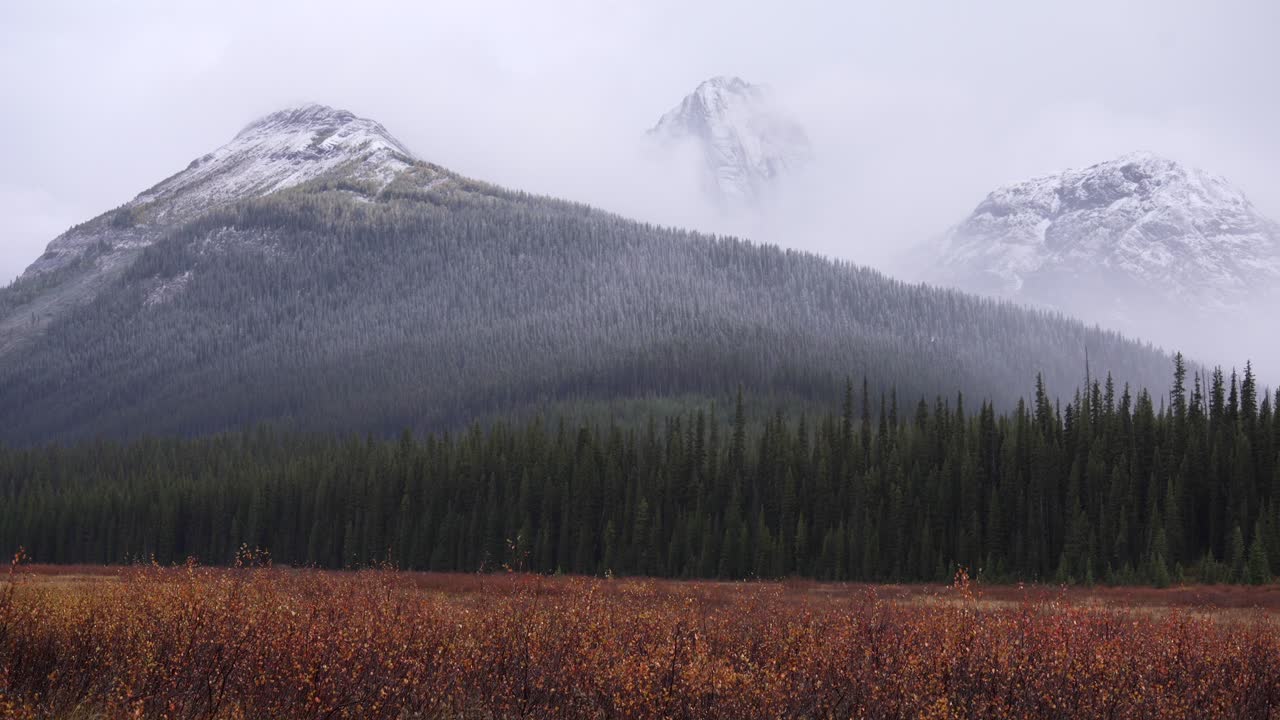Timelapse of clouds rolling over a mountain valley in Kananaskis, AB Canada.
