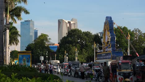 busy street scene in phnom penh, cambodia