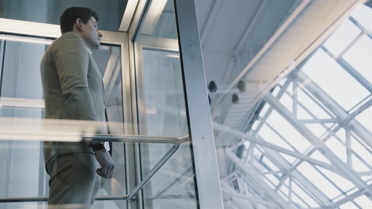 Businessman in Elevator