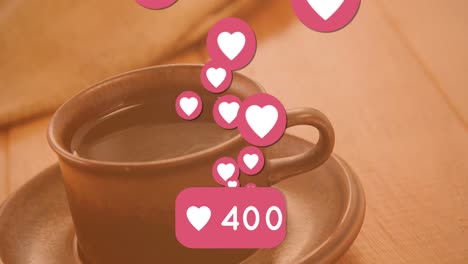 animación de corazones sobre una taza de café