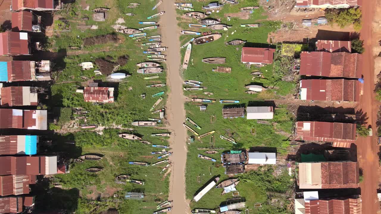 Aerial View of a Village with Numerous Boats and Houses on Tonle Sap Lake