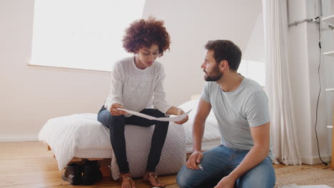 Couple-Having-Argument-Whilst-Putting-Together-Self-Assembly-Furniture