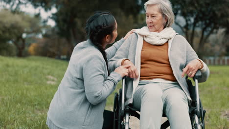 nurse support woman with disability in park