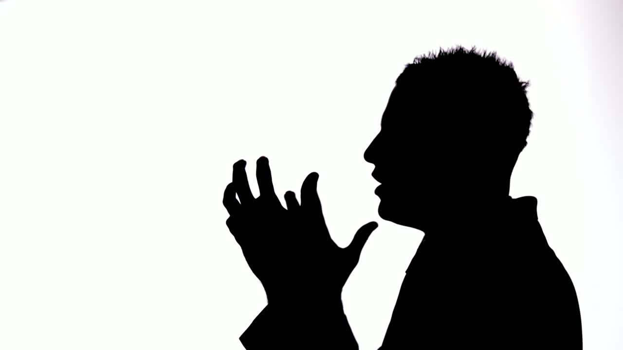 Silhouette of businessman giving out on white background