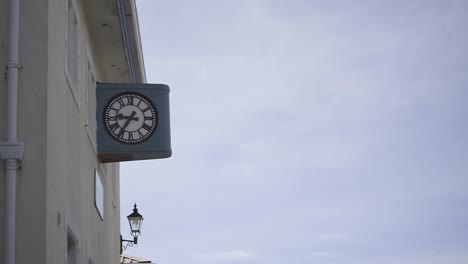vintage clock marking passage of time against architectural background, revealing urban landscape's timeless rhythm and heritage