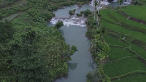 drone shot of the waikacura waterfalls sumba island east indonesia, aerial