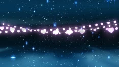 animation of christmas fairy lights, snowflakes and stars
