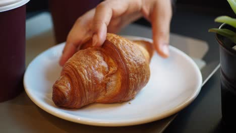 close up of a croissant on a plate