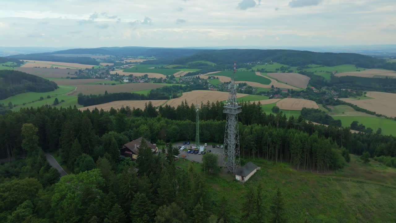 A view of the Czech landscape from a drone. A transmitter and an observation tower providing a view of the surroundings