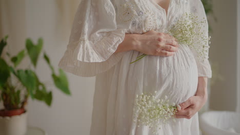Pregnant Woman Gently Caressing Belly